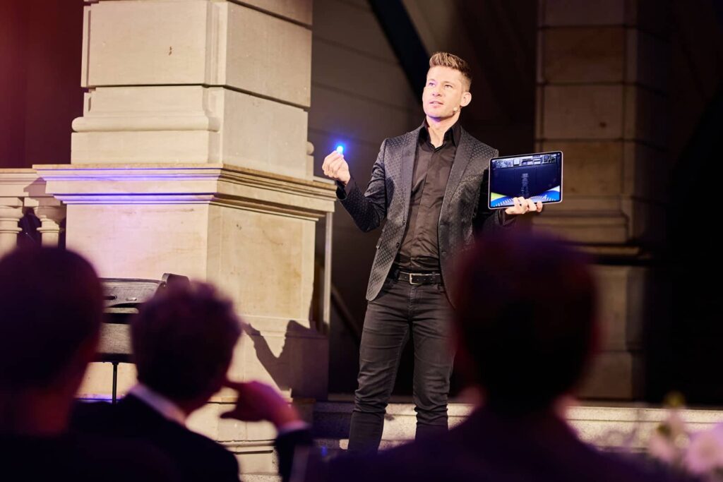 iPad magician at a conference.